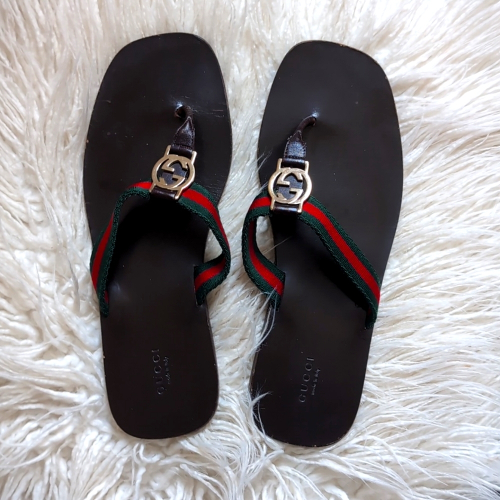 Gucci flip flops.